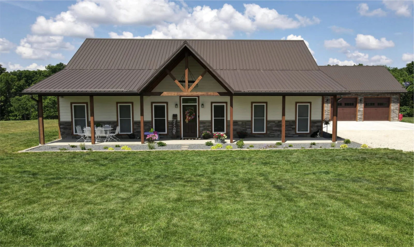 Ranch barndominium with timber gable